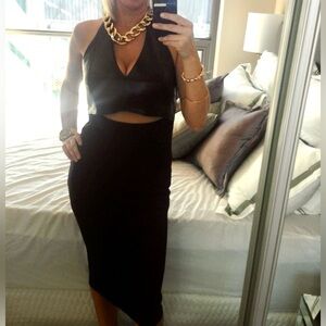 Marciano Dress. Faux leather on the top. Stretchy material on bottom.